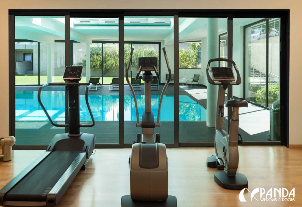 Installing-Glass-Pocket-Doors-to-Create-Fitness-Rooms-That-People-Will-Actually-Use---Sliding-Door-System-Pool-and-Gym