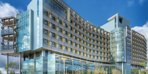 A large commercial building protected by specially made, triple-silver-coated low-E glass windows manufactured by Vitro Glass.