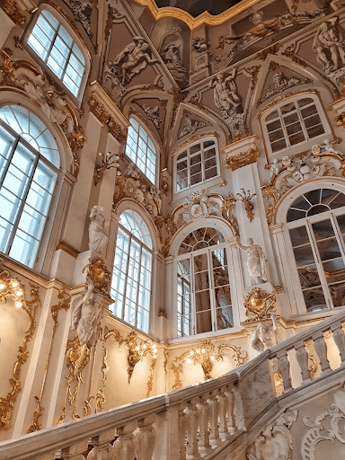 An image of the Jordan Staircase of the Hermitage Museum Winter Palace in St Petersburg, Russia, featuring custom luxury glass curved radius windows.